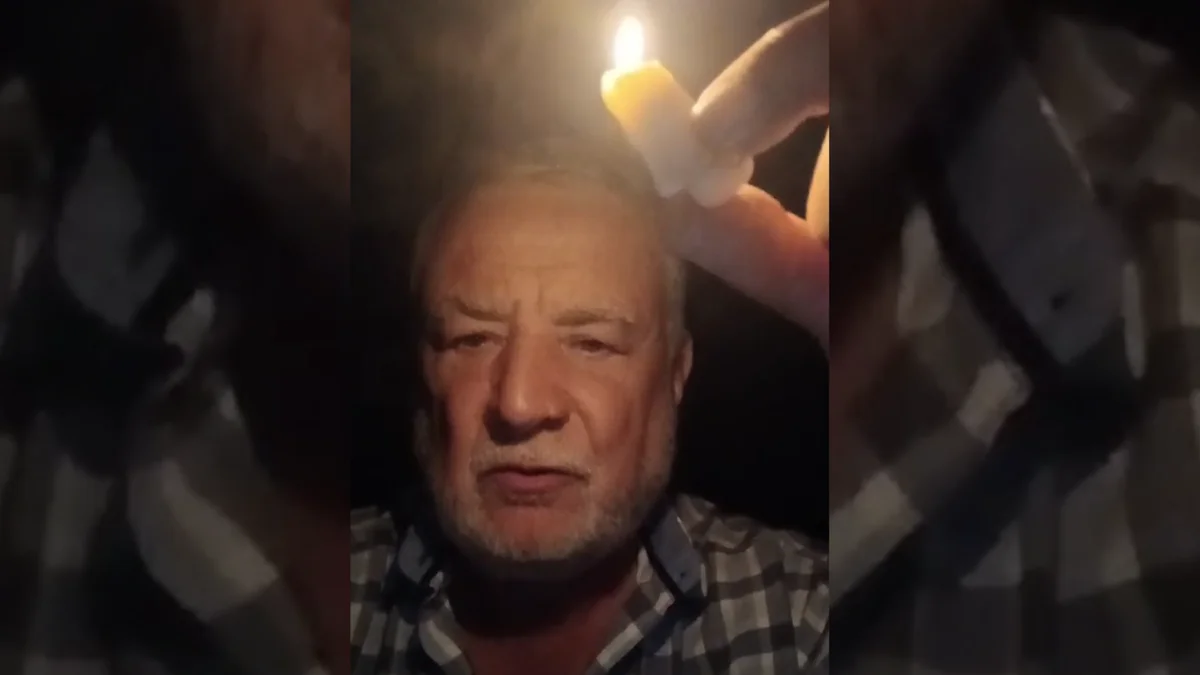 A la luz de una vela y de madrugada: curioso video de un senador que exigió explicaciones por los Nihuiles